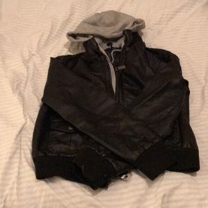 A faux leather black with grey fabric lining.